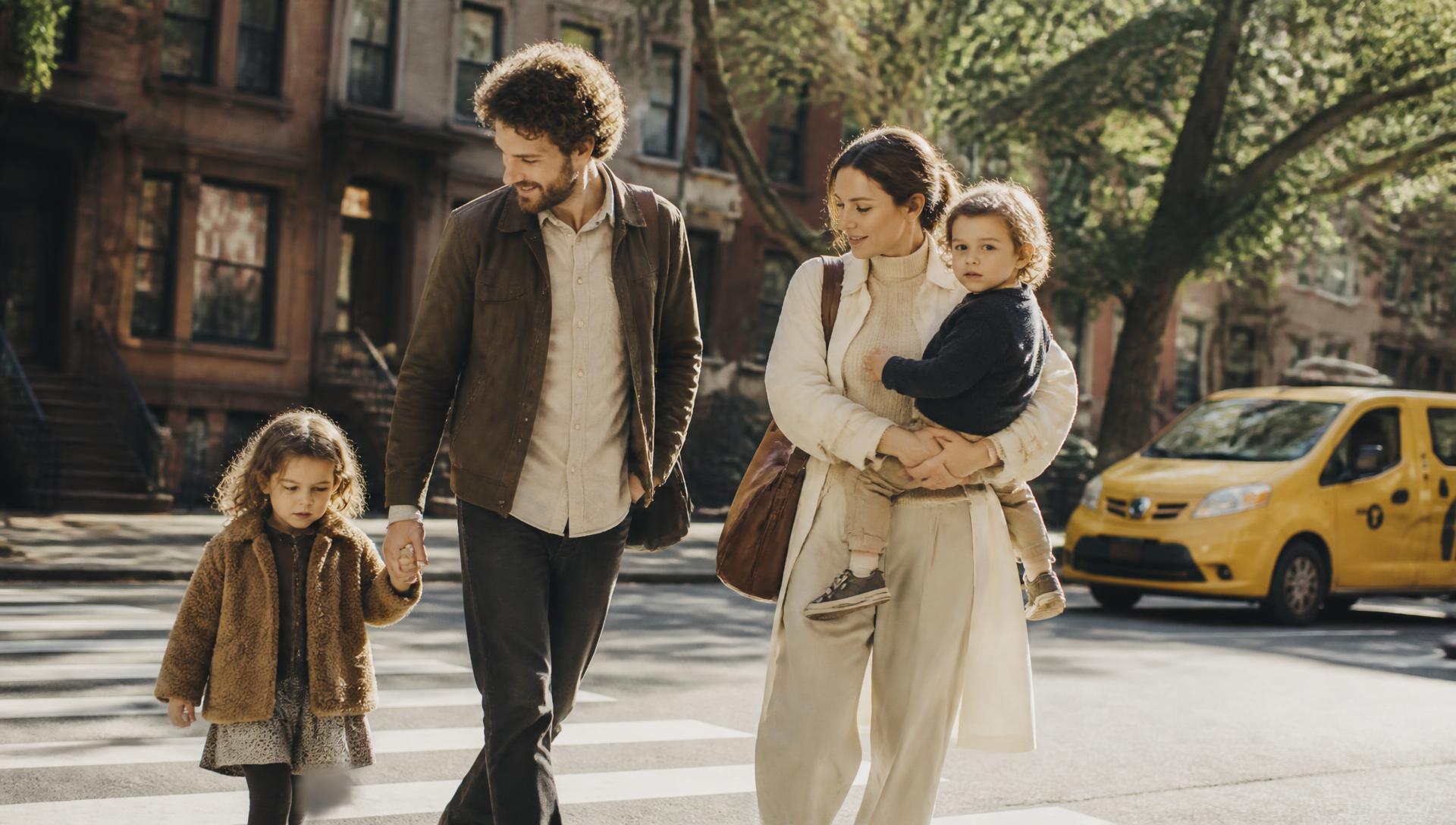A family walking together on a New York City street